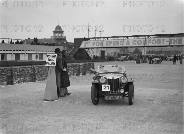 MG TA competing in the JCC Rally, Brooklands, Surrey, 1939. Artist: Bill Brunell.