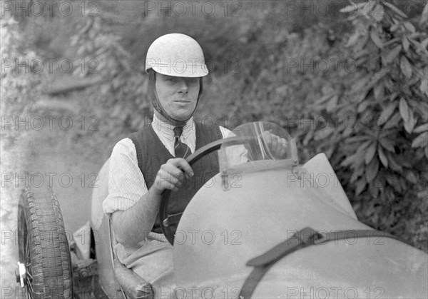 Charles Mortimer behind the wheel of an offset-bodied single-seater MG KN Special, c1930s Artist: Bill Brunell.