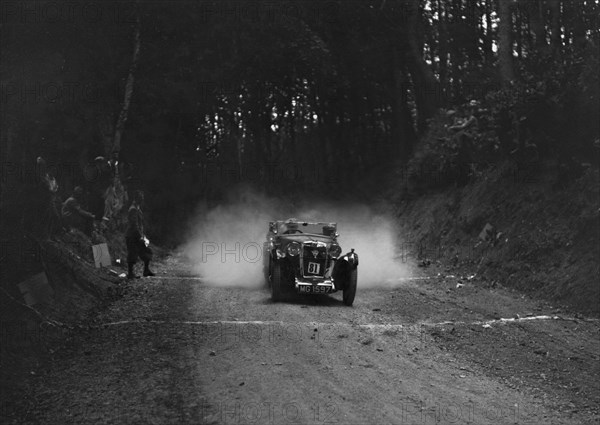 MG Magna taking part in a motoring trial, c1930s. Artist: Bill Brunell.