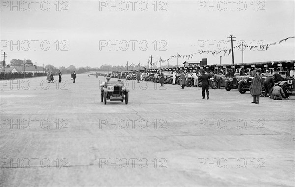 Austin 7 of FS and JD Barnes at the JCC Double Twelve Race, Brooklands, Surrey, 1929. Artist: Bill Brunell.