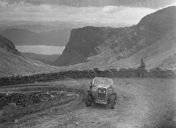 Singer Le Mans of TL McDonald competing in the RSAC Scottish Rally, 1936. Artist: Bill Brunell.