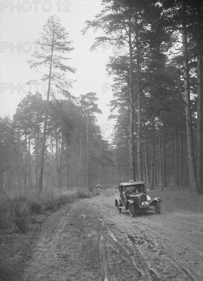 Cecil Randall's Talbot taking part in the JCC General Efficiency Trial, Oxshott Woods, Surrey, 1923. Artist: Bill Brunell.