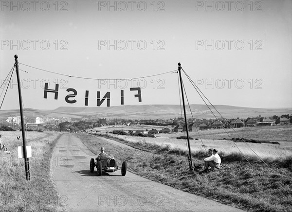 Bugatti Type 51 competing in the Bugatti Owners Club Lewes Speed Trials, Sussex, 1937. Artist: Bill Brunell.