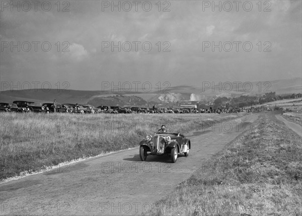 Frazer-Nash BMW competing in the Bugatti Owners Club Lewes Speed Trials, Sussex, 1937. Artist: Bill Brunell.