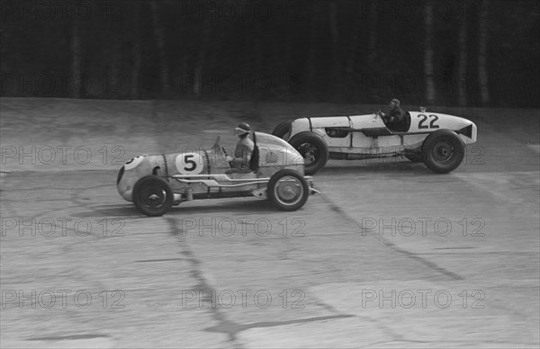 MG and Bowler-Hofman Special competing in the BRDC 500 Mile Race, Brooklands, 1937. Artist: Bill Brunell.