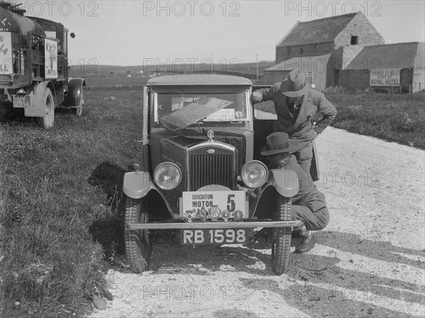 'Boy Blue 2', Wolseley Hornet saloon of DEM Douglas-Morris, B&HMC Brighton Motor Rally, 1930. Artist: Bill Brunell.