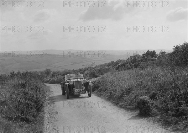 MG TA of WJ Green competing in the MCC Torquay Rally, 1938. Artist: Bill Brunell.