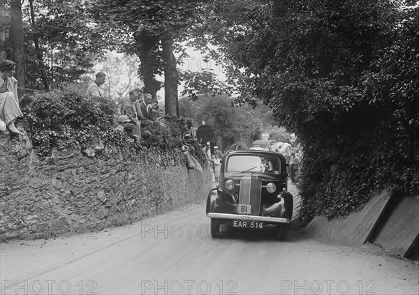 Vauxhall saloon of KFA Walker competing in the MCC Torquay Rally, 1938. Artist: Bill Brunell.