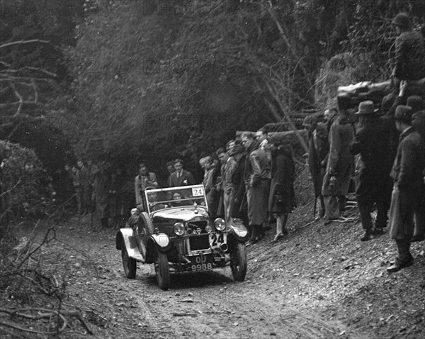 R Peaty's Singer open 4-seater tourer competing in the JCC Half-Day Trial, 1930. Artist: Bill Brunell.