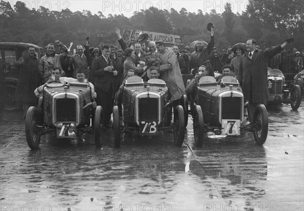 Three Austin 7 TT type Ulsters at the LCC Relay Grand Prix, Brooklands, 1931. Artist: Bill Brunell.