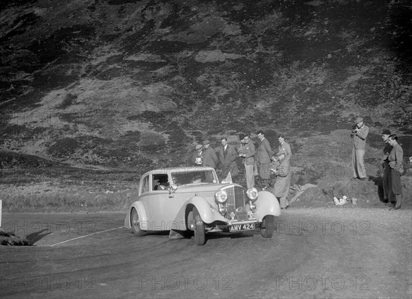 Bentley Airline saloon of Miss JM Nicholson, RSAC Scottish Rally, Devil's Elbow, Glenshee, 1934. Artist: Bill Brunell.