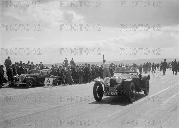 Riley Imp 2-seater of Dorothy Champney competing in the RSAC Scottish Rally, 1934. Artist: Bill Brunell.