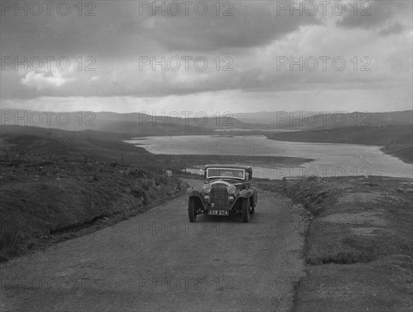 Bentley saloon of SK Thornley competing in the RSAC Scottish Rally, 1934. Artist: Bill Brunell.