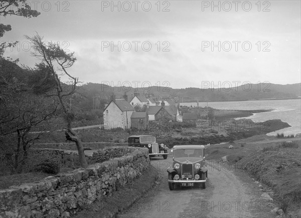 Armstrong-Siddeley 12/6 saloon of JC Wilson competing in the RSAC Scottish Rally, 1934. Artist: Bill Brunell.