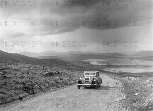 Alvis Speed Twenty saloon competing in the RSAC Scottish Rally, 1934. Artist: Bill Brunell.