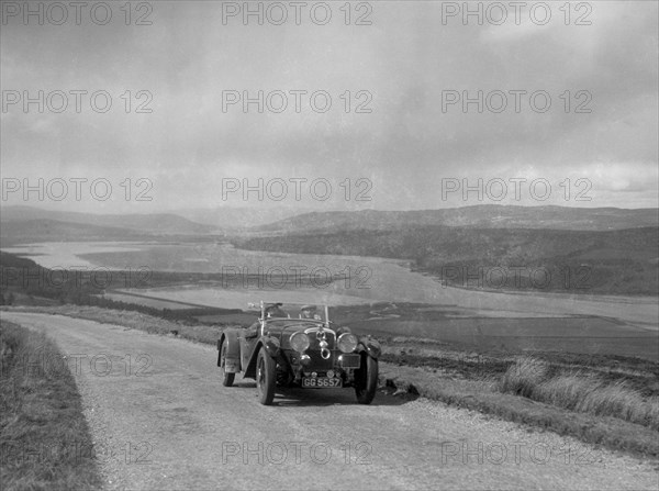 Alvis Speed Twenty tourer of I Fraser-Marshall competing in the RSAC Scottish Rally, 1934. Artist: Bill Brunell.