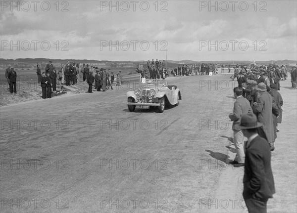 SS 1 4-seater tourer competing in the RSAC Scottish Rally, 1934. Artist: Bill Brunell.