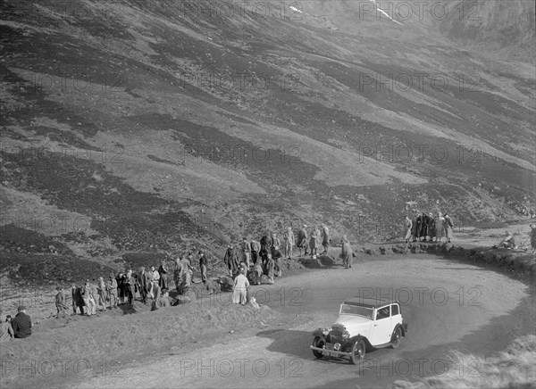 Austin sports saloon of Mrs MS Flewitt at the RSAC Scottish Rally, Devil's Elbow, Glenshee, 1934. Artist: Bill Brunell.