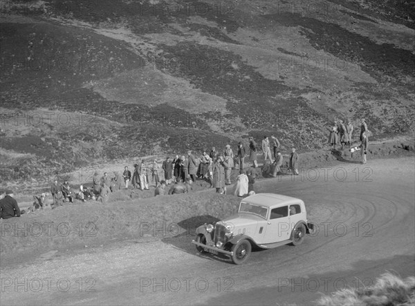 Austin 12/6 of JW Flewitt at the RSAC Scottish Rally, Devil's Elbow, Glenshee, 1934. Artist: Bill Brunell.