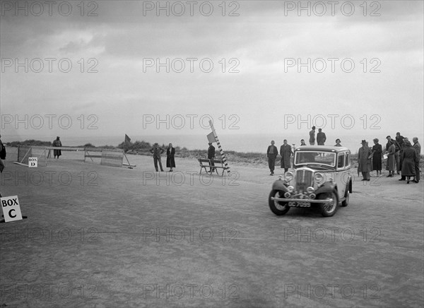 Standard Twelve saloon of Mrs SH Richards competing in the RSAC Scottish Rally, 1934. Artist: Bill Brunell.