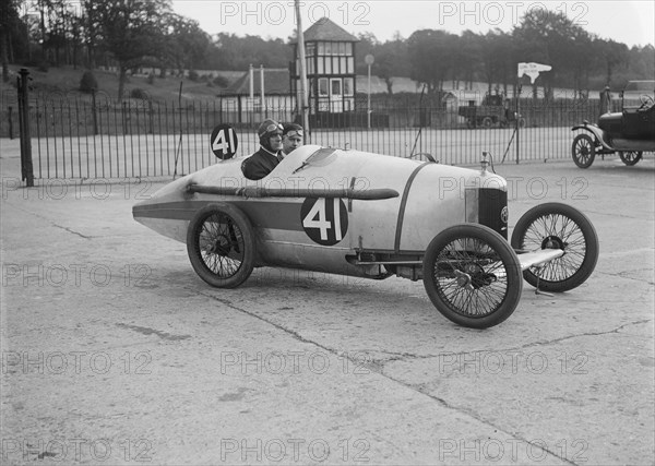 Sammy Davis in his AC at the JCC 200 Mile Race, Brooklands, Surrey, 1921. Artist: Bill Brunell.