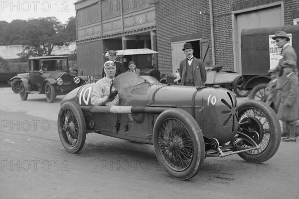 Henry Segrave in his Sunbeam 2 litre GP at Brooklands, Surrey, 1922. Artist: Bill Brunell.