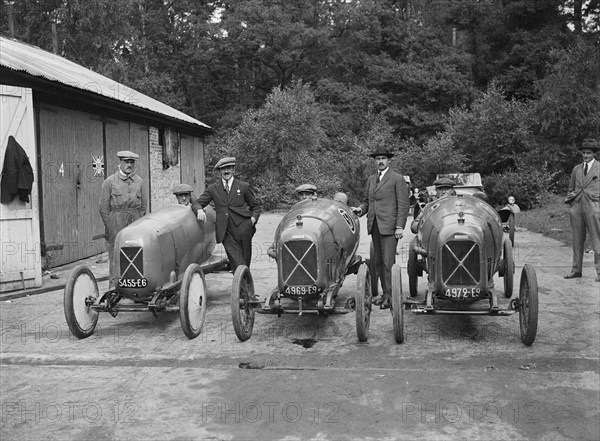 Three Salmsons at the JCC 200 Mile Race, Brooklands, Surrey, 1922. Artist: Bill Brunell.