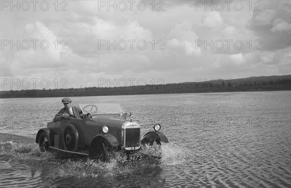 HG Pope driving a GWK through water at a demonstration event, Frensham Common Pond, Surrey, 1922. Artist: Bill Brunell.