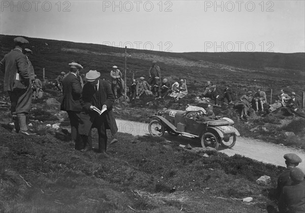 Amilcar open 2-seater of AE Bull competing in the Scottish Light Car Trial, 1922. Artist: Bill Brunell.