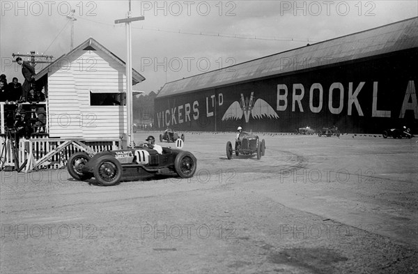 Talbot Special of Henry Segrave leading a Bugatti, JCC 200 Mile Race, Brooklands, 1926. Artist: Bill Brunell.