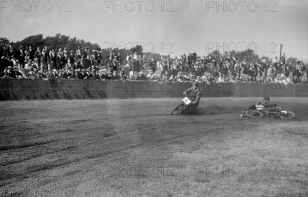 Speedway race at Lea Bridge Stadium, Leyton, London, 1928.   Artist: Bill Brunell.