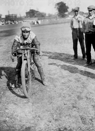 American speedway rider Art Pecha on his Harley-Davidson, Lea Bridge Stadium, Leyton, London, 1928.  Artist: Bill Brunell.