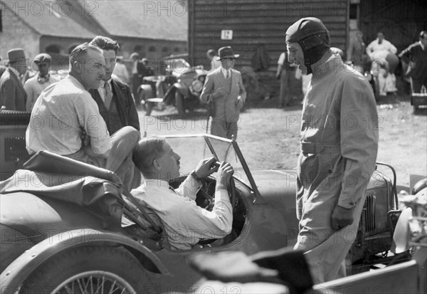 Earl Howe beside a Riley 9 Brooklands at the MAC Shelsley Walsh Hillclimb, Worcestershire, c1930s. Artist: Bill Brunell.