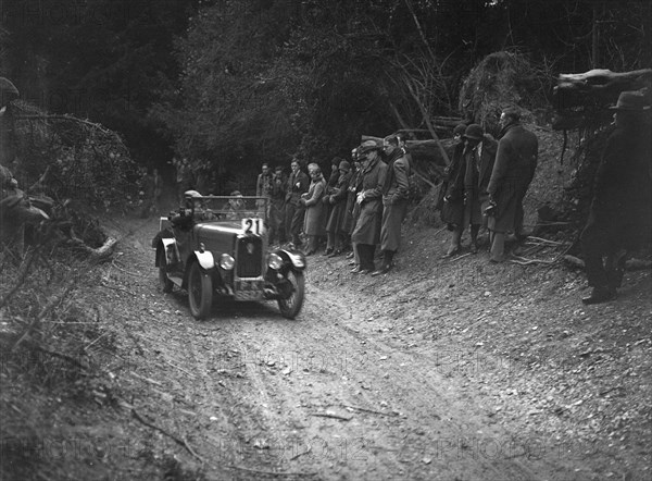 Triumph Super Seven of FA Thatcher, JCC Half-Day Trial, Goat Track, Ranmore Common, Surrey, 1930. Artist: Bill Brunell.