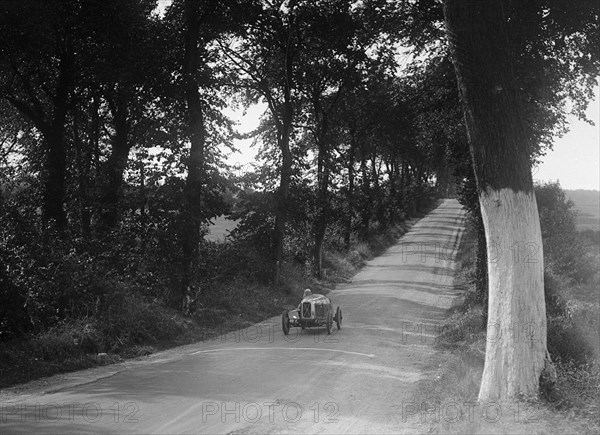 Salmson competing at the Boulogne Motor Week, France, 1928. Artist: Bill Brunell.