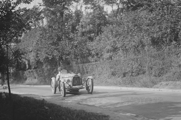 Bugatti competing at the Boulogne Motor Week, France, 1928. Artist: Bill Brunell.