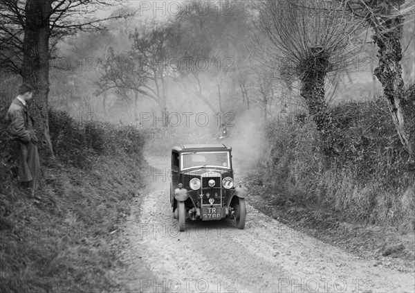 Triumph Scorpion of FM Hill competing in the NWLMC London-Gloucester Trial, 1931. Artist: Bill Brunell.