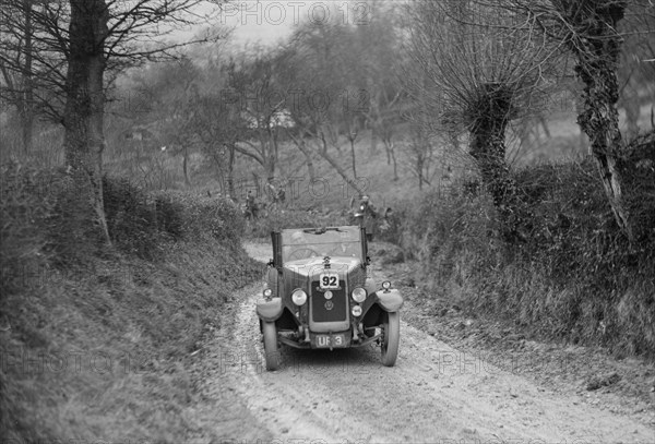 Bayliss-Thomas of WJ Haward competing in the NWLMC London-Gloucester Trial, 1931. Artist: Bill Brunell.