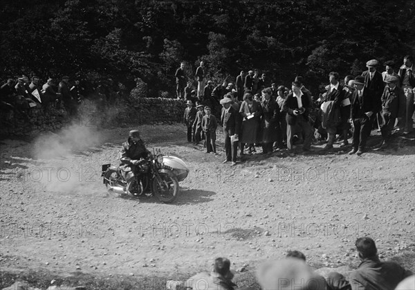 Rudge-Whitworth and sidecar of FV Garratt competing in the MCC Edinburgh Trial, 1930. Artist: Bill Brunell.