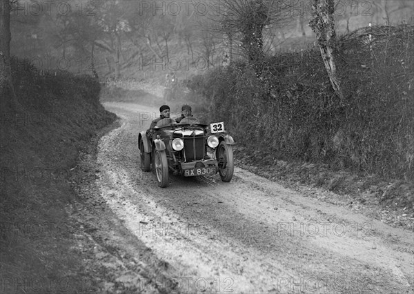 MG C-type of HS Linfield competing in the Inter-Varsity Trial, 1930s. Artist: Bill Brunell.