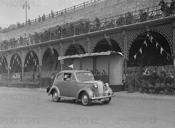 Vauxhall 10 of Miss IM Burton at the RAC Rally, Madeira Drive, Brighton, 1939. Artist: Bill Brunell.