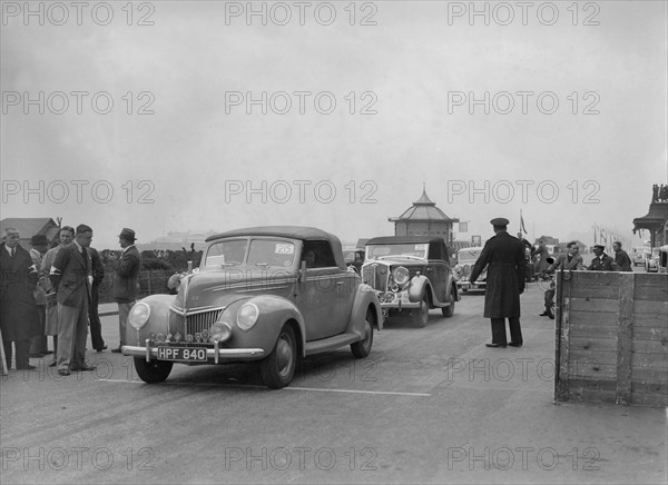 Ford V8 drophead of DB Hall at the RAC Rally, Madeira Drive, Brighton, 1939. Artist: Bill Brunell.