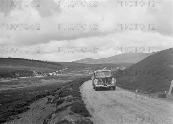 Ford V8 saloon of Joan Chetwynd, RSAC Scottish Rally, 1933. Artist: Bill Brunell.