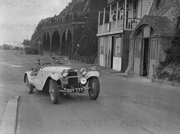 HRG of MH Lawson competing in the RAC Rally, Madeira Drive, Brighton, 1939. Artist: Bill Brunell.