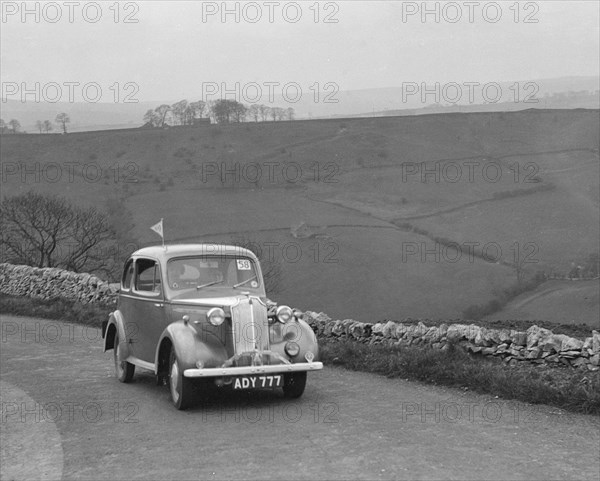 Vauxhall 10 of Miss IM Burton competing in the RAC Rally, 1939 Artist: Bill Brunell.