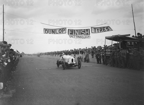 Bentley TT of Frank Clement at the finish of the Southsea Speed Carnival, Hampshire. 1922. Artist: Bill Brunell.