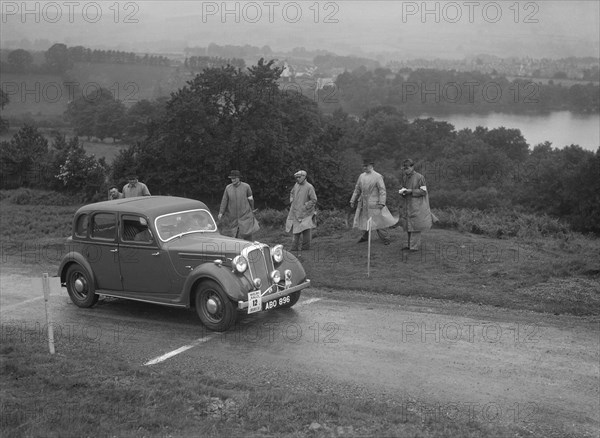 Rover saloon of DB Morgan competing in the South Wales Auto Club Welsh Rally, 1937 Artist: Bill Brunell.