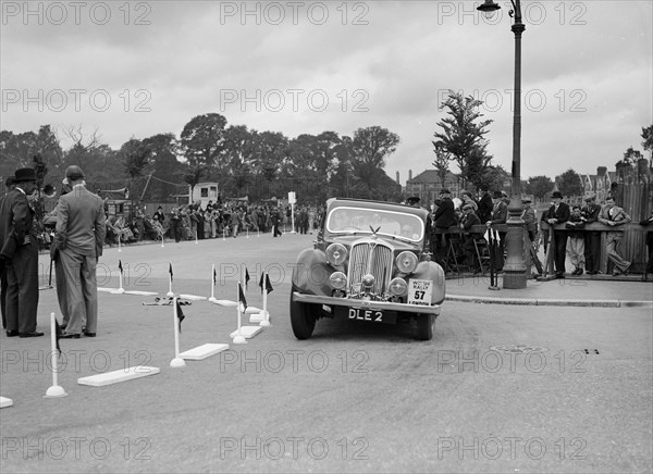 Rover 4-door saloon of FD Cooper competing in the South Wales Auto Club Welsh Rally, 1937 Artist: Bill Brunell.