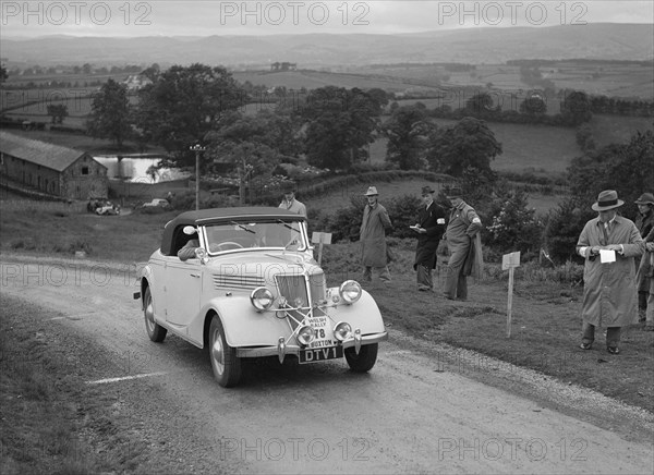 Renault Primaquatre of HC Brownlow competing in the South Wales Auto Club Welsh Rally, 1937 Artist: Bill Brunell.