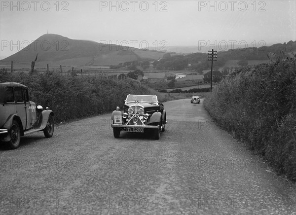 Rover 12/4 of WP Maidens competing in the South Wales Auto Club Welsh Rally, 1937 Artist: Bill Brunell.
